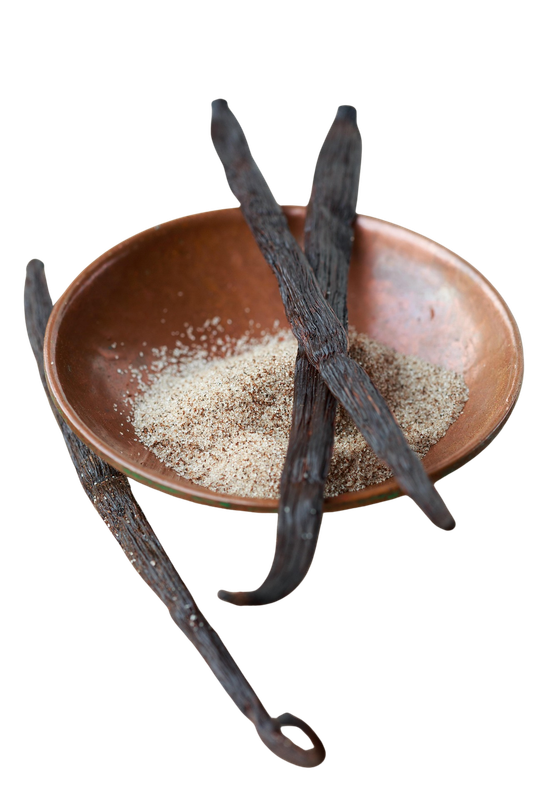 Vanilla beans and seeds in a wooden bowl